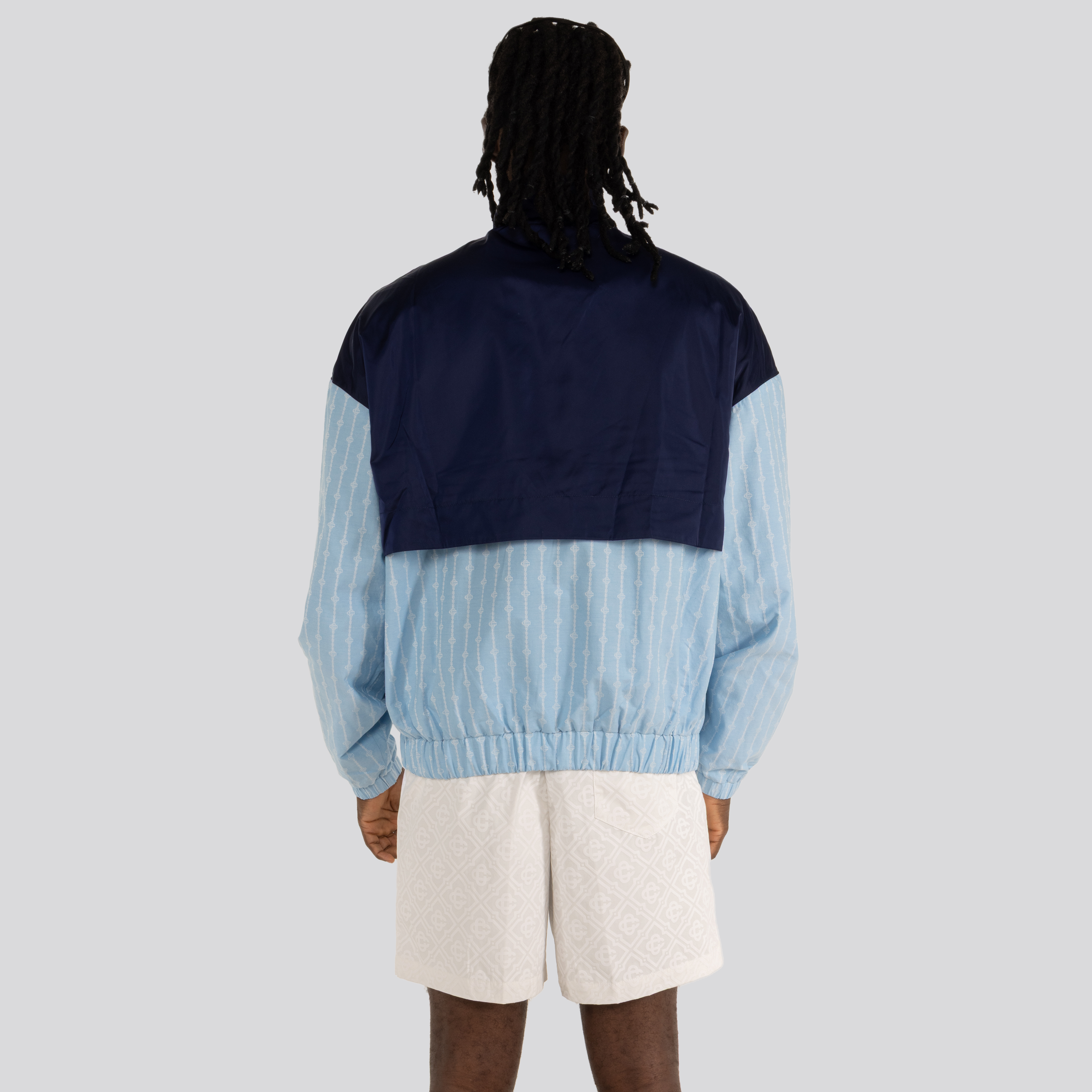 Chaqueta Celeste Casablanca Logo