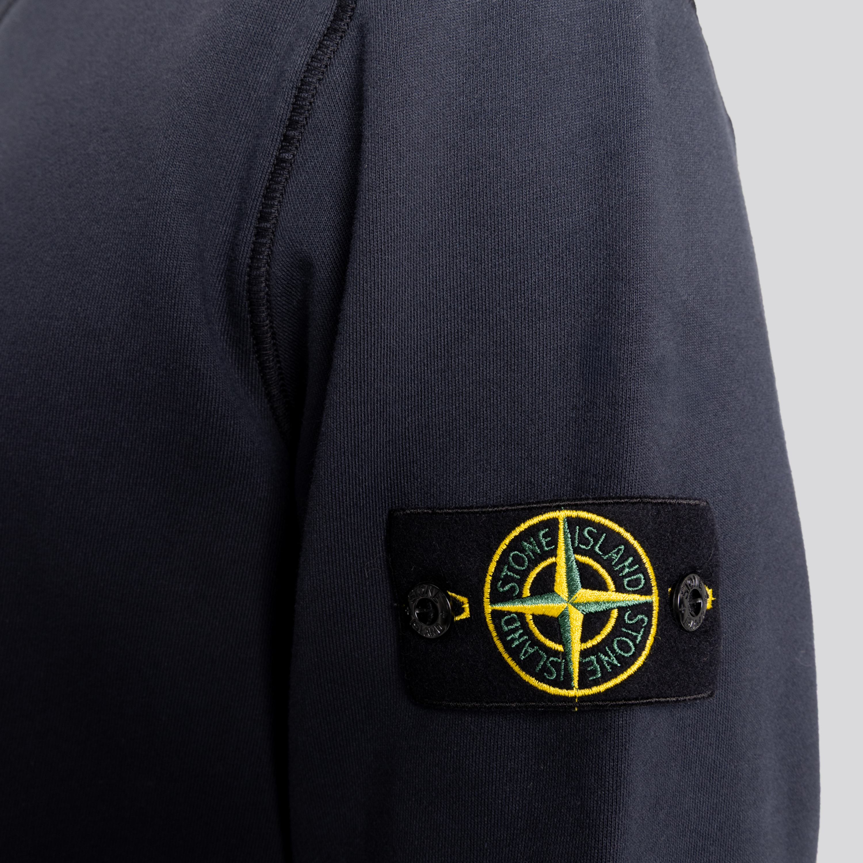 Buzo Negro Stone Island Tag