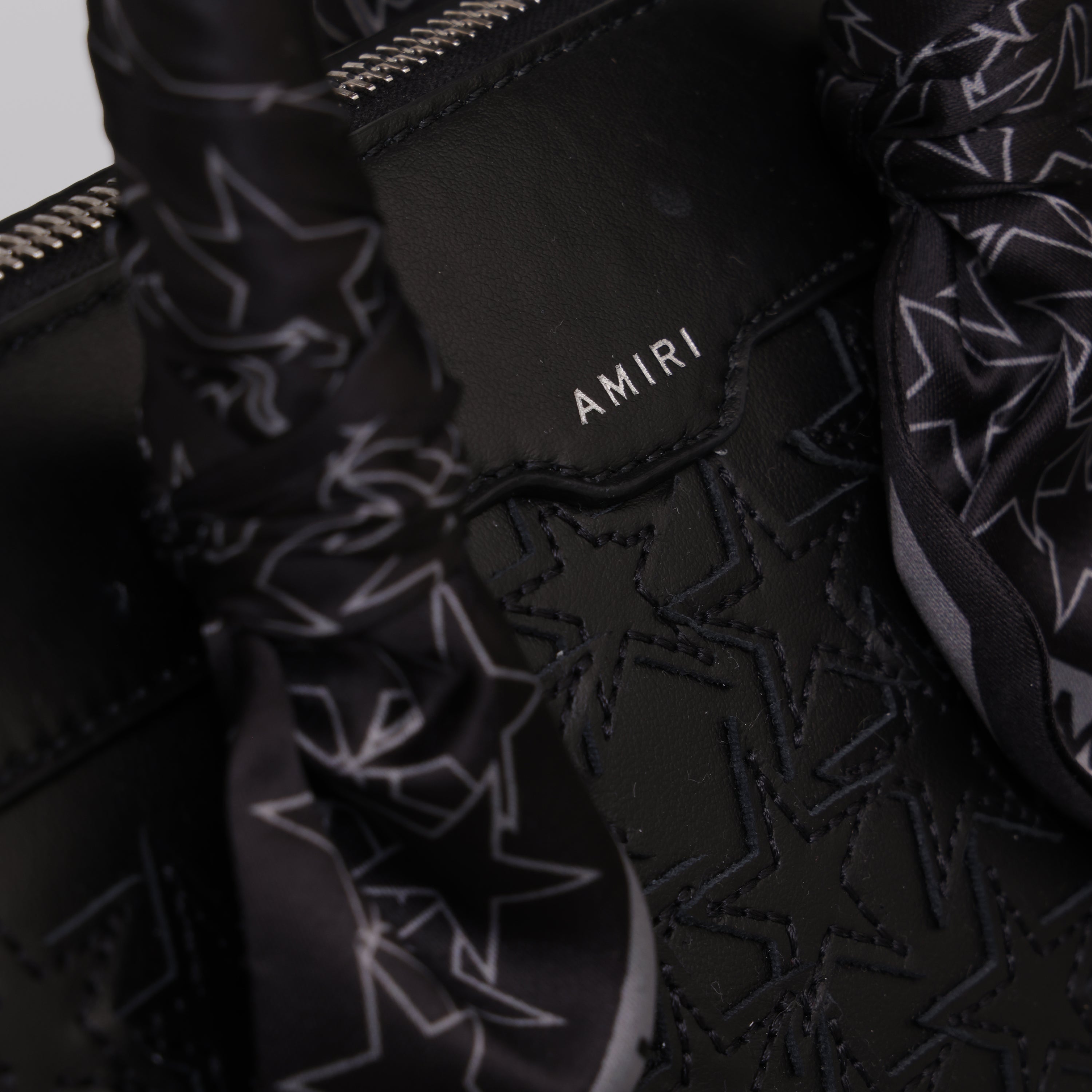 Cartera Negra AMIRI Stars Micro Triangle