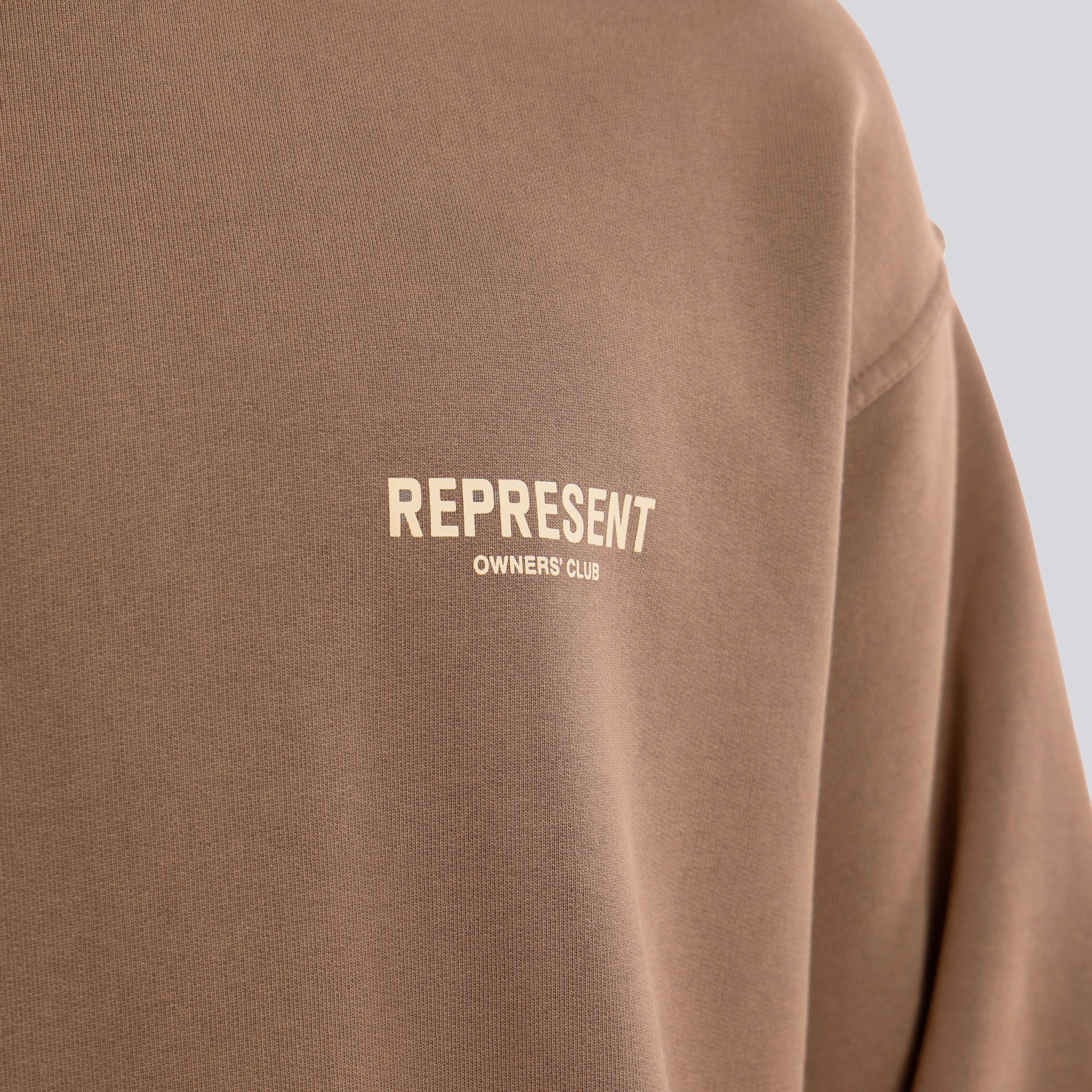 Buzo Beige Represent Owners Club