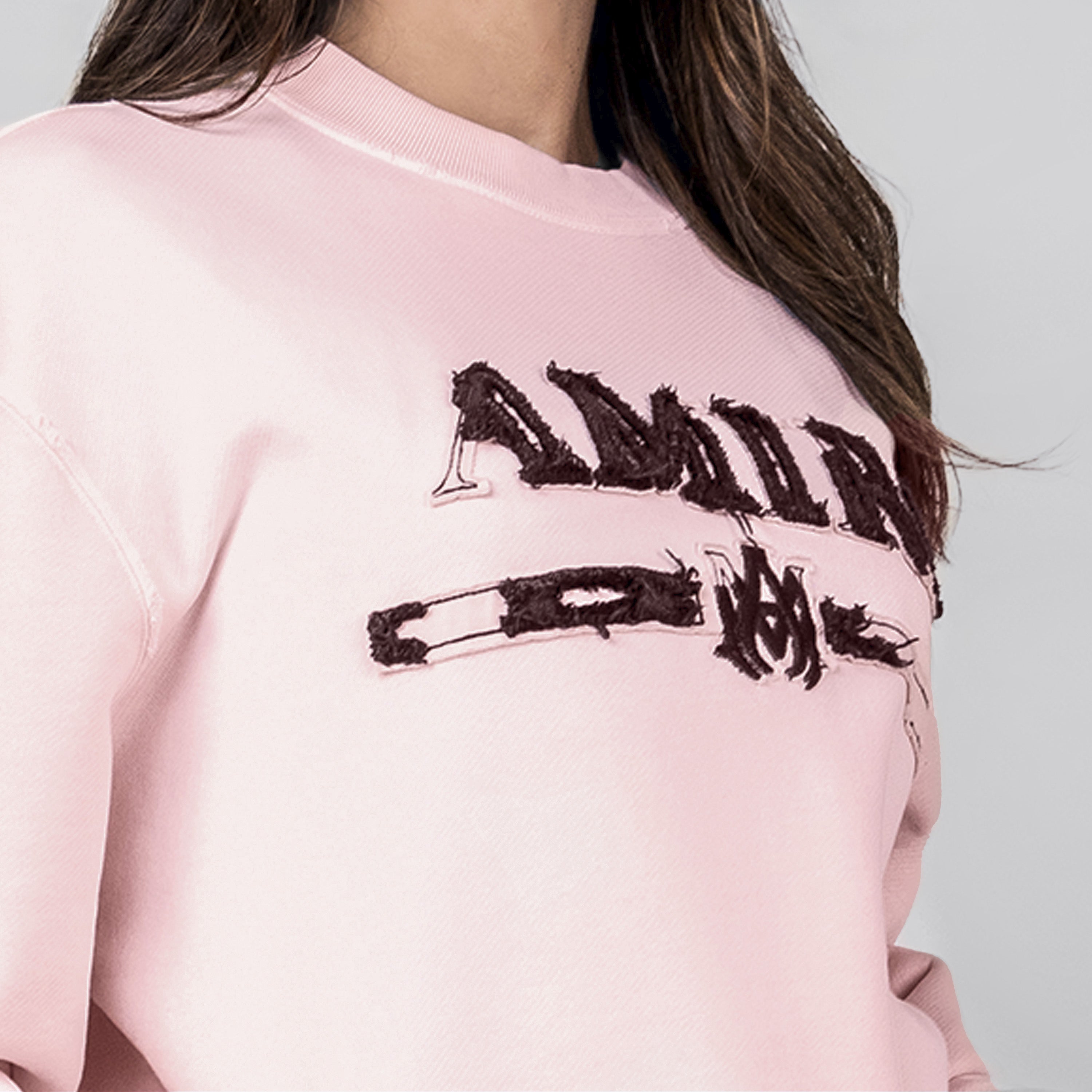 Buzo Rosado AMIRI Side Logo
