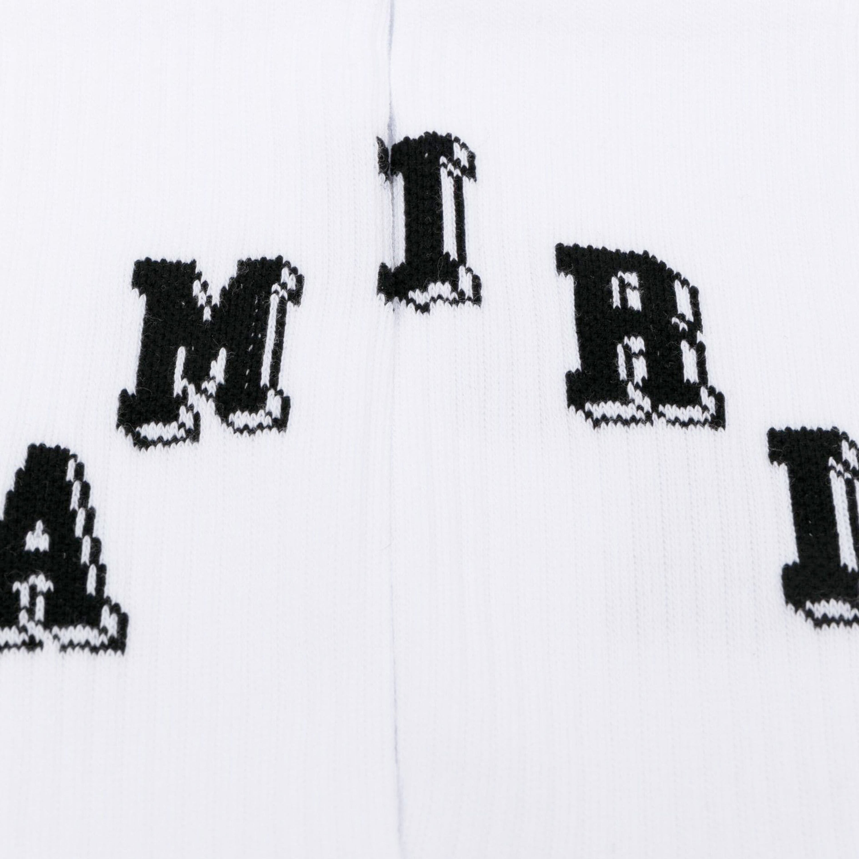 Medias Blancas AMIRI Logo