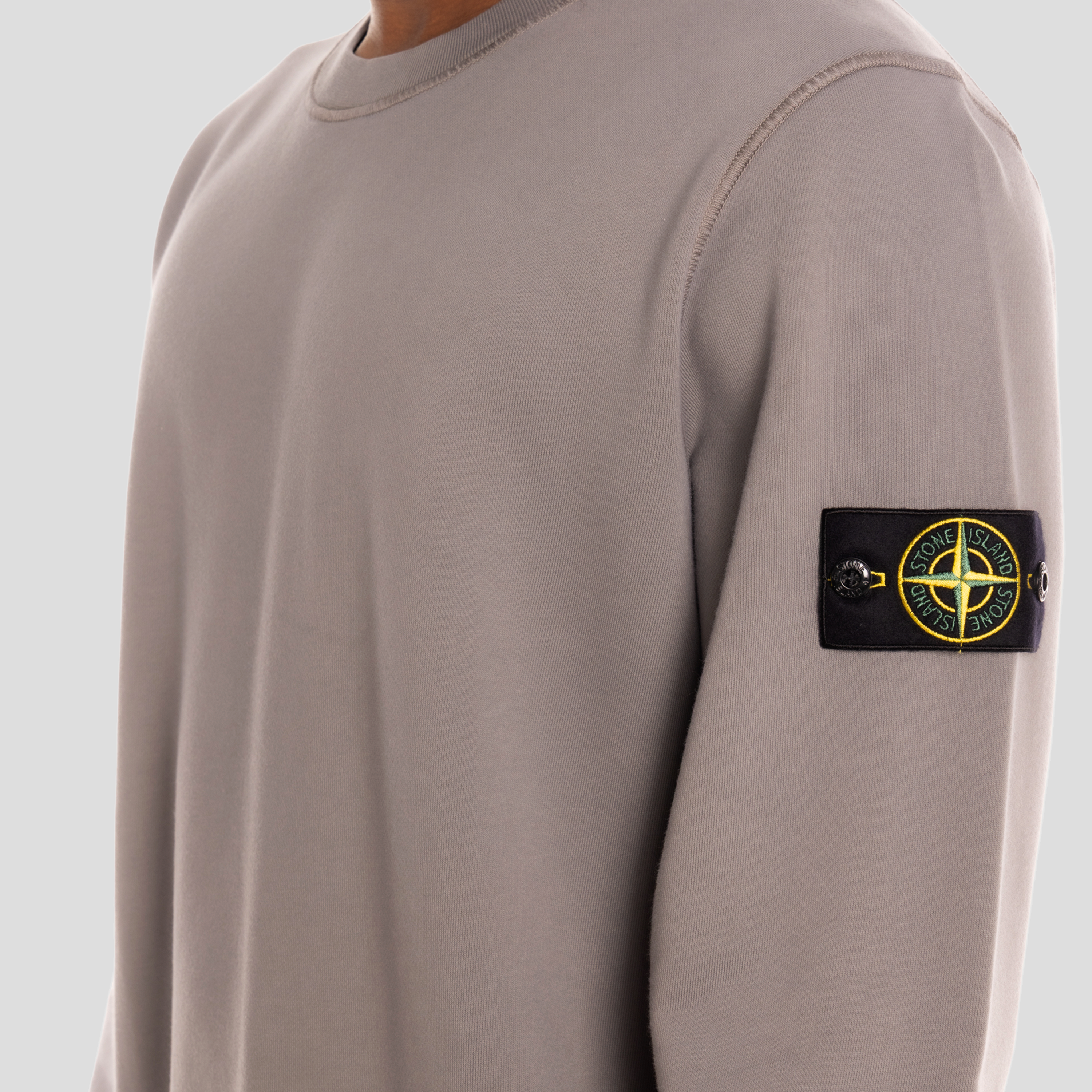 Buzo Gris Stone Island Tag