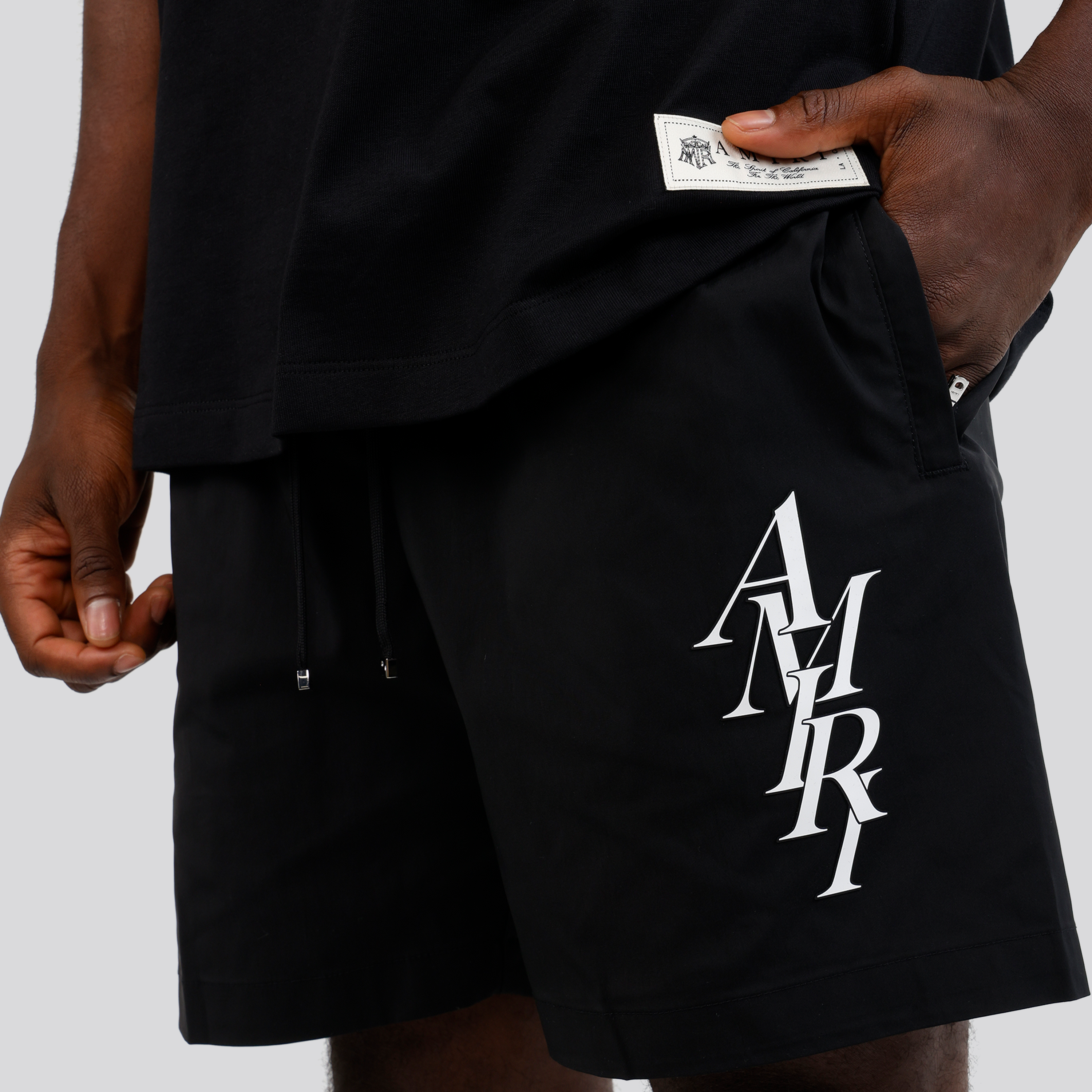 Pantaloneta Negra AMIRI Stack Logo