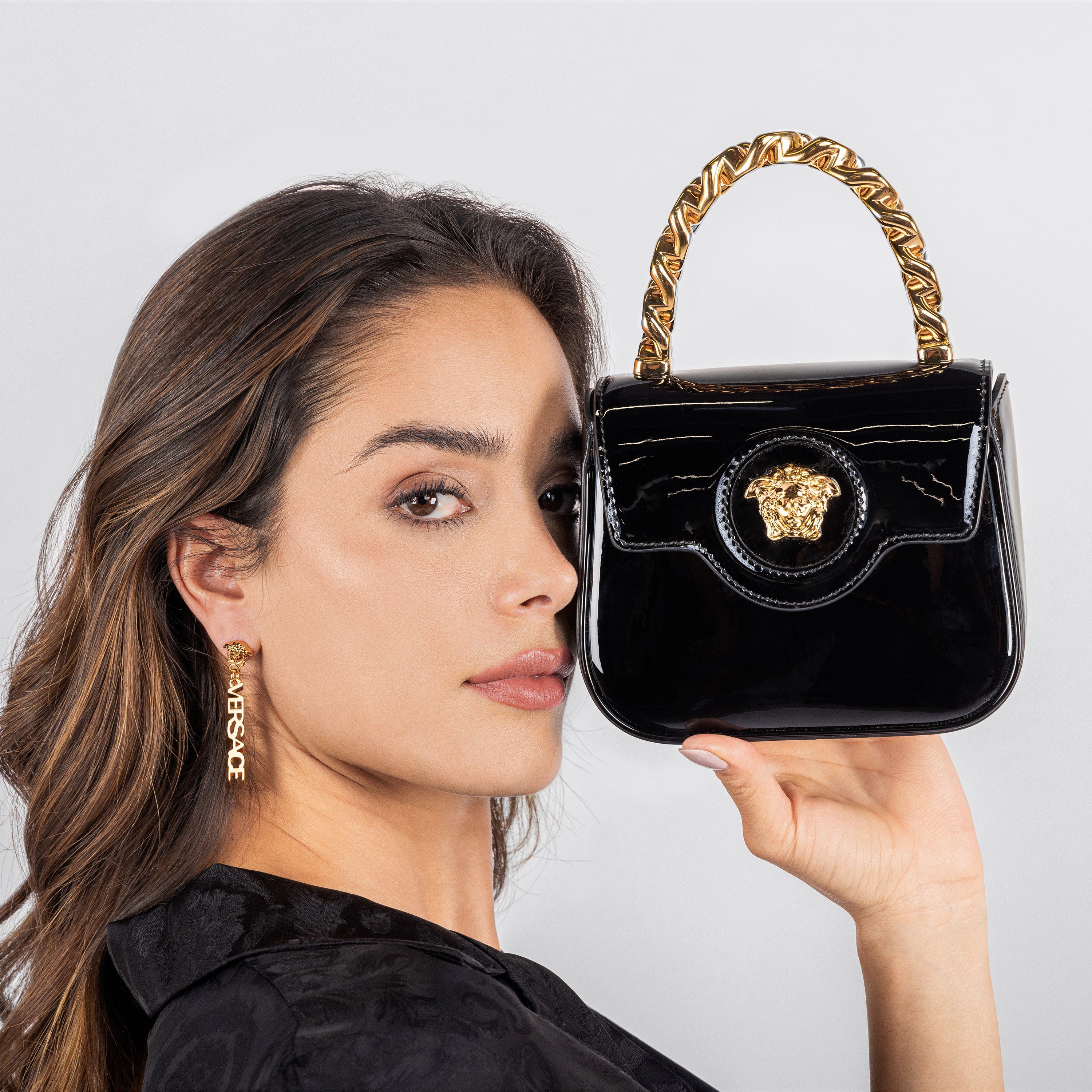 Bolsa best sale versace negra