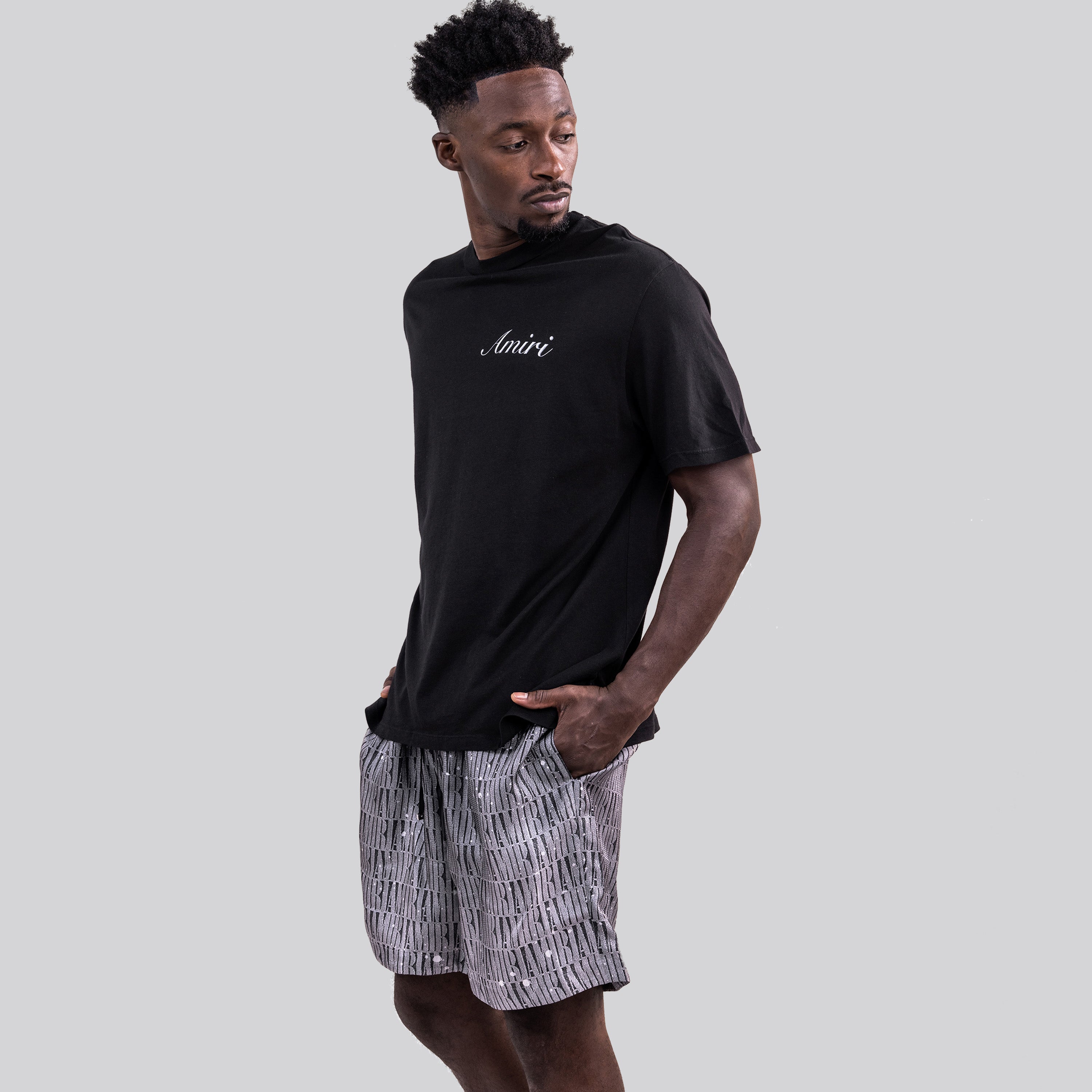 Pantaloneta Gris AMIRI Multilogo
